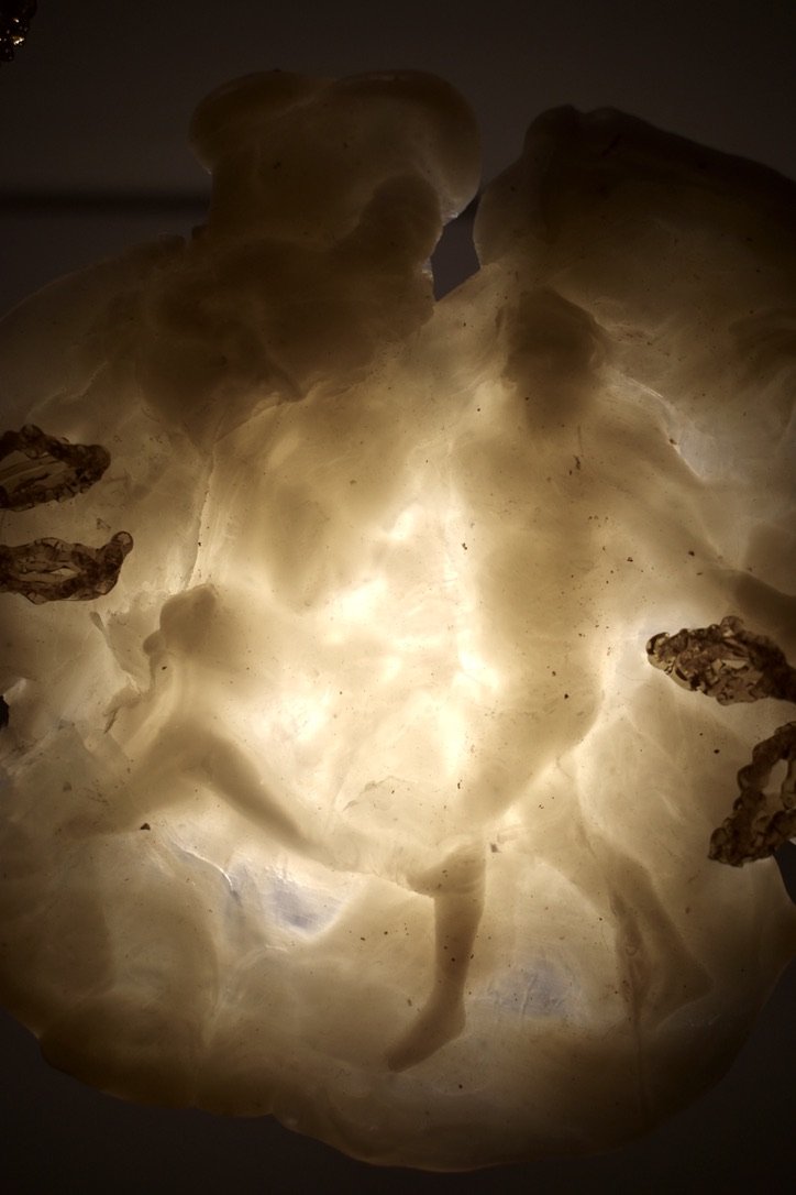 Close-up of the Hylas and the Naiads shade: figures in translucent recycled HDPE