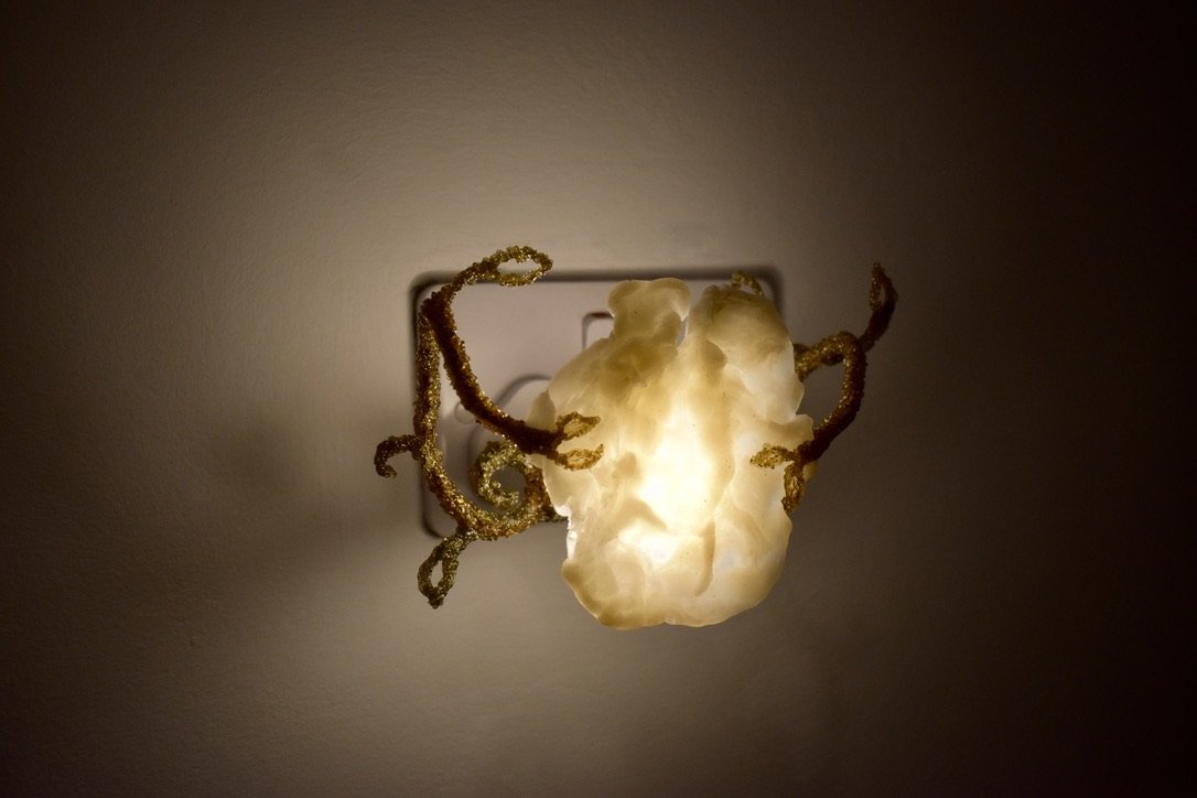 Hylas and the Naiads night light glowing on the wall