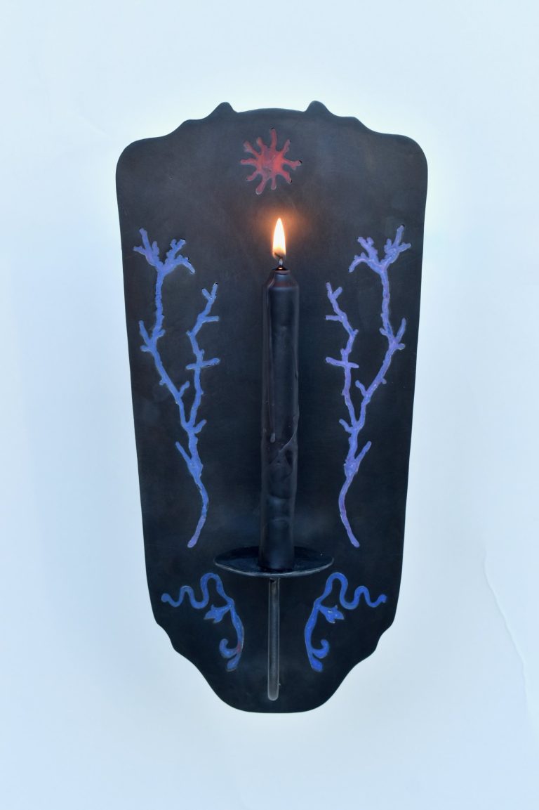 Pietra Plastica wall candle holder in black steel inlaid with blue branches and a red sun