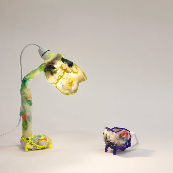 Living in the Plasticene: a lamp and a small pot made from melted domestic plastic waste