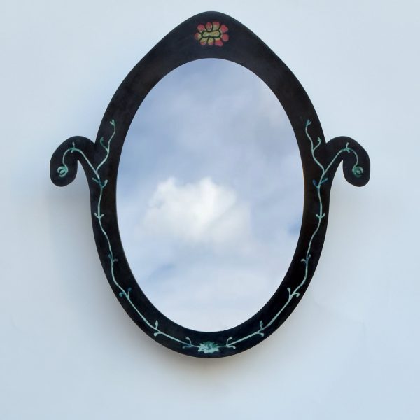 Pietra Plastica oval mirror in black steel inlaid with recycled plastic vines and a small rosette